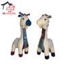 Stuffed animal in the shape of a Giraffe made of ethnic fabric